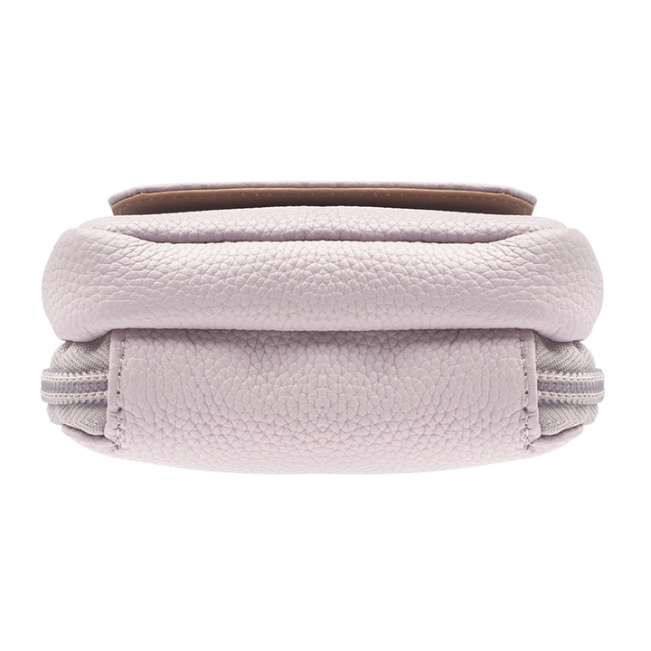 Lavender concealed carry crossbody phone pouch made from pebble grain American cowhide, designed for compact firearm storage with a slim, stylish profile.