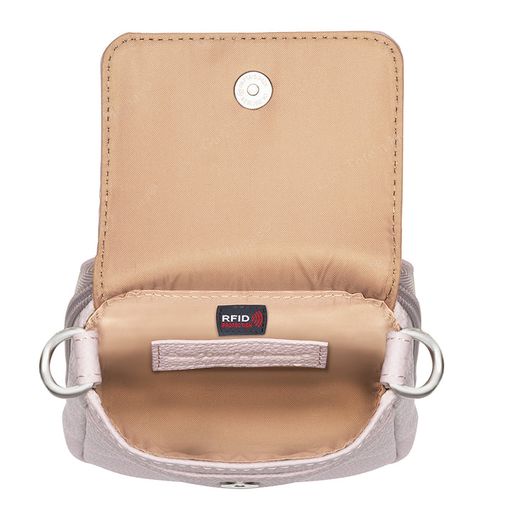 Lavender concealed carry crossbody phone pouch made from pebble grain American cowhide, designed for compact firearm storage with a slim, stylish profile.