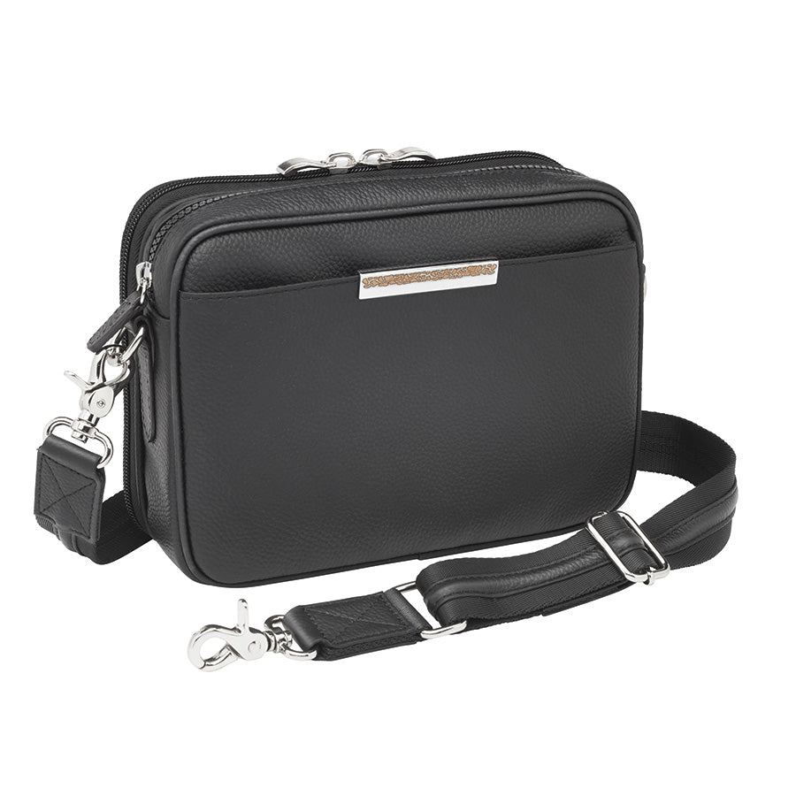 Stylish black leather and chrome accessories Slim Clutch crossbody concealed carry bag with slim profile, designed for discreet firearm storage and easy access. Perfect for essentials and compact firearms, offering both elegance and security