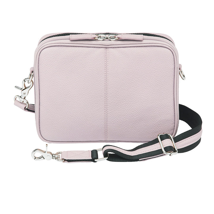 Stylish lavender Slim Clutch crossbody concealed carry bag with slim profile, designed for discreet firearm storage and easy access. Perfect for essentials and compact firearms, offering both elegance and security