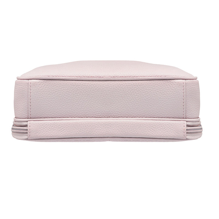 Stylish lavender Slim Clutch crossbody concealed carry bag with slim profile, designed for discreet firearm storage and easy access. Perfect for essentials and compact firearms, offering both elegance and security