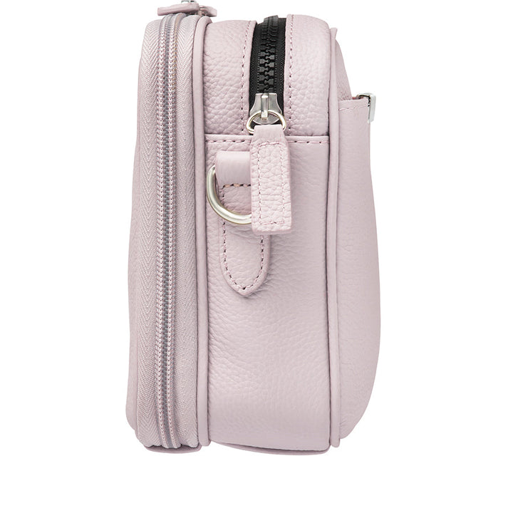 Stylish lavender Slim Clutch crossbody concealed carry bag with slim profile, designed for discreet firearm storage and easy access. Perfect for essentials and compact firearms, offering both elegance and security