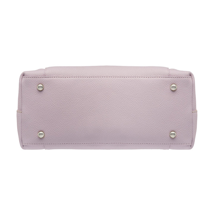 Elegant lavender Town Tote concealed carry purse made from top grain cowhide with pebble texture. Features spacious interior, RFID-blocking pocket, and hidden firearm compartment with dual zip access. Includes slash-resistant strap, chrome hardware, and room for tablets, water bottles, and everyday essentials