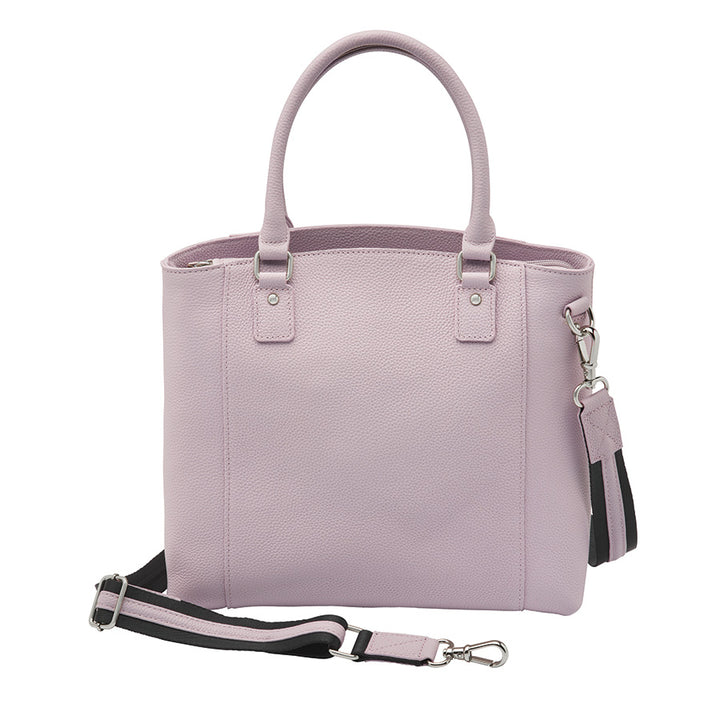 Elegant lavender Town Tote concealed carry purse made from top grain cowhide with pebble texture. Features spacious interior, RFID-blocking pocket, and hidden firearm compartment with dual zip access. Includes slash-resistant strap, chrome hardware, and room for tablets, water bottles, and everyday essentials