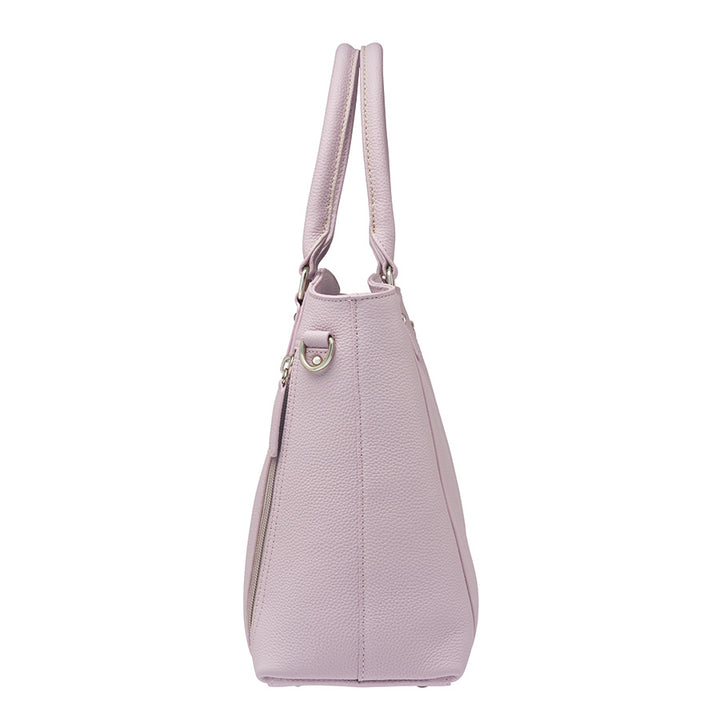 Elegant lavender Town Tote concealed carry purse made from top grain cowhide with pebble texture. Features spacious interior, RFID-blocking pocket, and hidden firearm compartment with dual zip access. Includes slash-resistant strap, chrome hardware, and room for tablets, water bottles, and everyday essentials