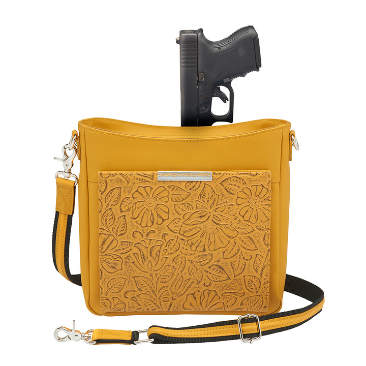 Mustard yellow slim crossbody concealed carry purse crafted from durable American cowhide, featuring compact design and discreet firearm compartment for everyday carry