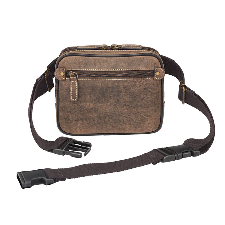 Distressed buffalo leather waist sling concealed carry bag with ambidextrous draw, padded firearm compartment, and included mini holster. Fits compact handguns like Sig Sauer P365, Ruger LCP, and Springfield Hellcat. Designed for side or angled carry with hook-and-loop adjustability