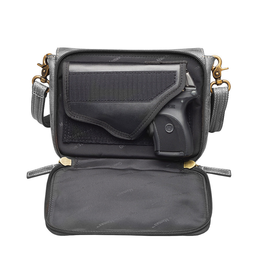 Modern gray crossbody concealed carry organizer purse made of vintage tanned leather, with a discreet firearm compartment, lightweight design, and quick-access zippered opening.