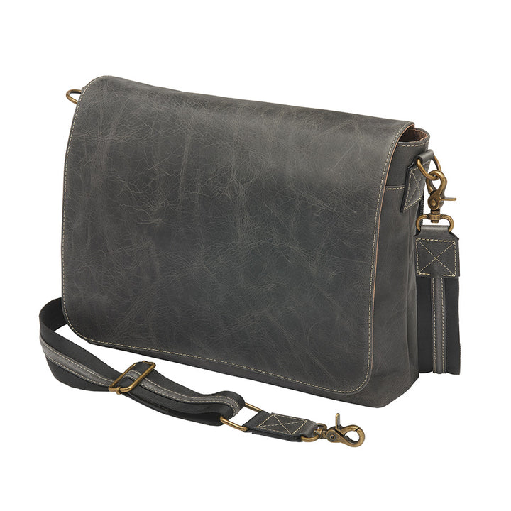 Distressed grey unisex concealed carry crossbody messenger bag in full grain buffalo leather with rich patina, RFID-blocking pocket, magnetic flap closure, and adjustable slash-resistant strap. Features a spacious main compartment and padded gun pocket compatible with Glock 19, Sig P365, S&W M&P 2.0, and more.