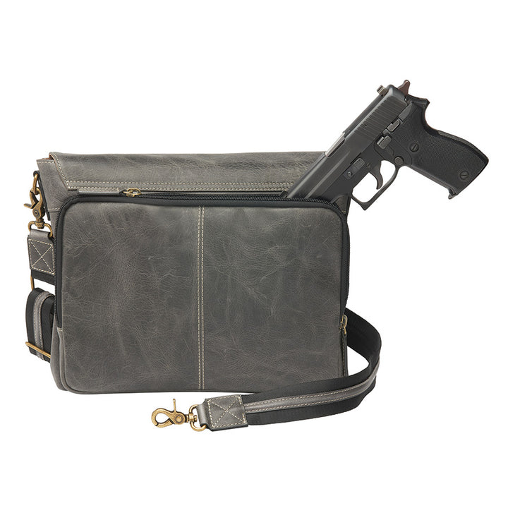 Distressed grey unisex concealed carry crossbody messenger bag in full grain buffalo leather with rich patina, RFID-blocking pocket, magnetic flap closure, and adjustable slash-resistant strap. Features a spacious main compartment and padded gun pocket compatible with Glock 19, Sig P365, S&W M&P 2.0, and more.