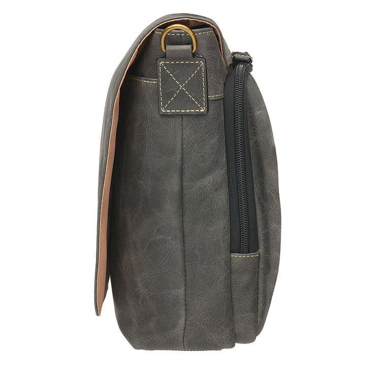 Distressed grey unisex concealed carry crossbody messenger bag in full grain buffalo leather with rich patina, RFID-blocking pocket, magnetic flap closure, and adjustable slash-resistant strap. Features a spacious main compartment and padded gun pocket compatible with Glock 19, Sig P365, S&W M&P 2.0, and more.