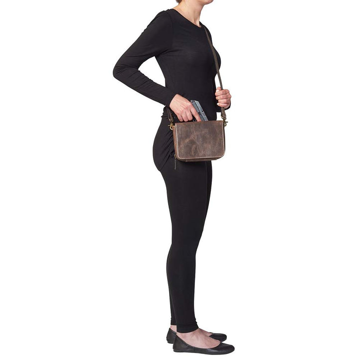 Classic brown leather crossbody organizer concealed carry purse with secure zippered gun compartment, compact size, and durable construction for reliable and discreet carry.