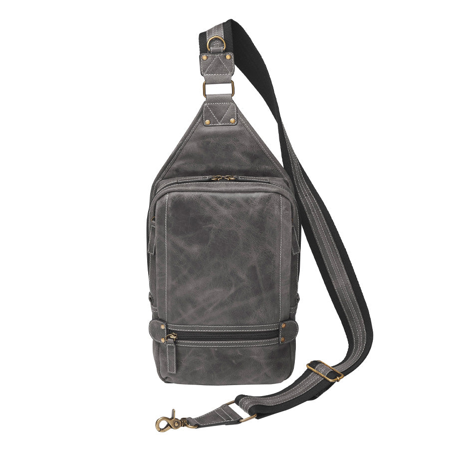 Distressed gray buffalo leather sling concealed carry from front backpack with tactical organization, RFID zip pocket, padded holster compartment for Glock 19, Sig P320, and HK VP9, slash-proof strap, and swing-front crossbody design with 3 exterior zip pockets and morale patch zone