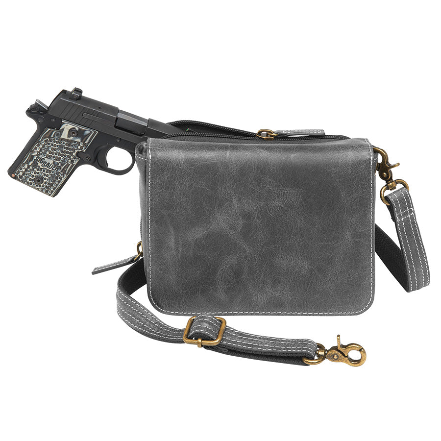 Modern gray crossbody concealed carry organizer purse made of vintage tanned leather, with a discreet firearm compartment, lightweight design, and quick-access zippered opening.