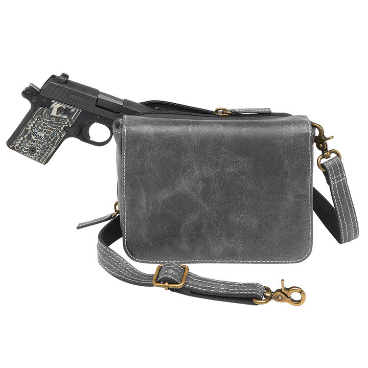 Modern gray crossbody concealed carry organizer purse made of vintage tanned leather, with a discreet firearm compartment, lightweight design, and quick-access zippered opening.