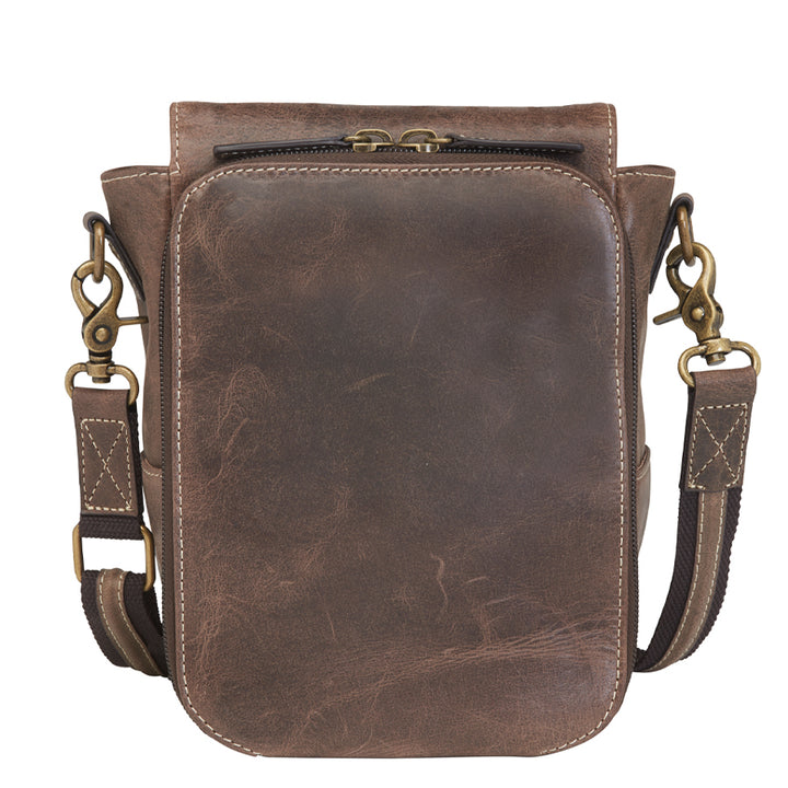 Back view of GTM/CZY-80 Distressed Leather Crossbody Satchel worn by model showing distressed leather texture and secure adjustable strap with reinforced stitching
