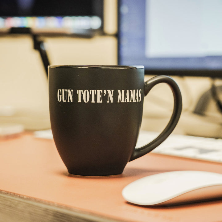 Professional girl in a offie with BISTRO Gun Tote’n Mamas mug with laser-etched logo – two-toned matte black and glossy blue, 16oz ceramic stoneware, dishwasher safe, free shipping