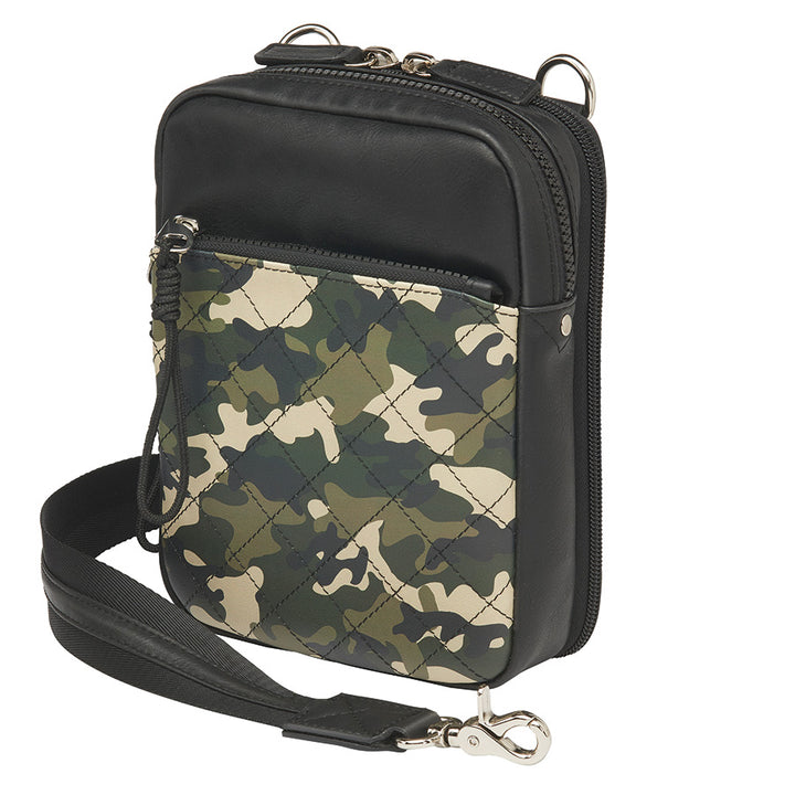Compact camo-patterned crossbody concealed carry bag with black leather accents, slash-resistant strap, RFID protection, and a secure zippered front pocket for discreet firearm storage