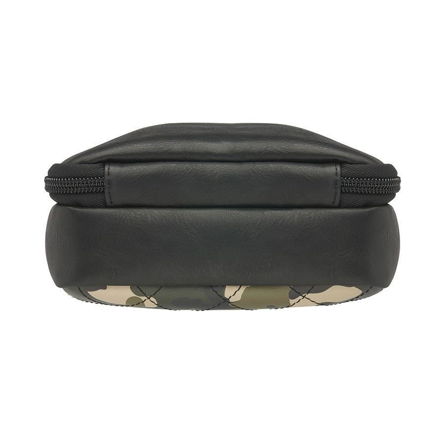 Compact camo-patterned crossbody concealed carry bag with black leather accents, slash-resistant strap, RFID protection, and a secure zippered front pocket for discreet firearm storage