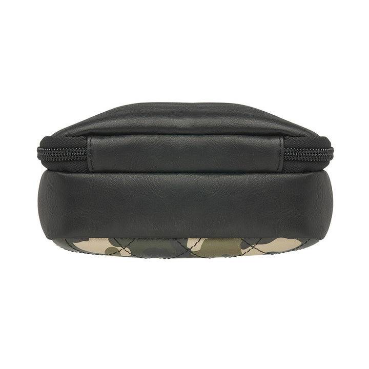 Compact camo-patterned crossbody concealed carry bag with black leather accents, slash-resistant strap, RFID protection, and a secure zippered front pocket for discreet firearm storage