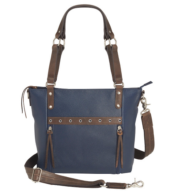 Blue indigo BOHO shoulder tote concealed carry purse combining soft American cowhide and distressed vintage buffalo leather, featuring top draw GTM compartment with rare earth magnets, RFID-protected zippered pocket, adjustable slash-resistant shoulder strap with 11-ply steel cable, antiqued brass hardware, nylon coil zippers, and textured faux bottom with metal feet for stability.