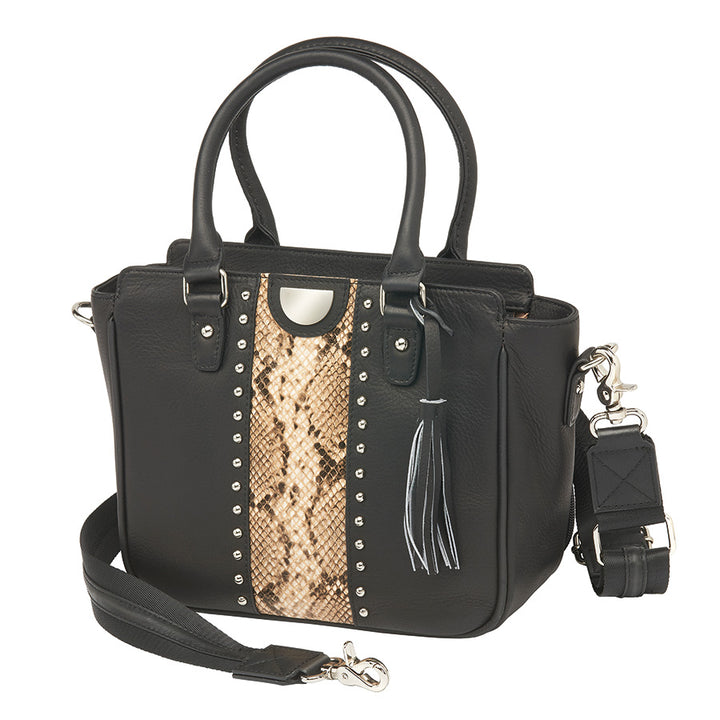 Black Park Ave Hand Tote Concealed Carry Purse featuring snake-embossed top grain cowhide, South American full-grain cowhide accents, chrome rivets, and a leather tassel. Includes top zippered opening, RFID-protected interior zip pocket, and two open pockets. Equipped with slash-resistant, adjustable shoulder strap, and two top carry handles.