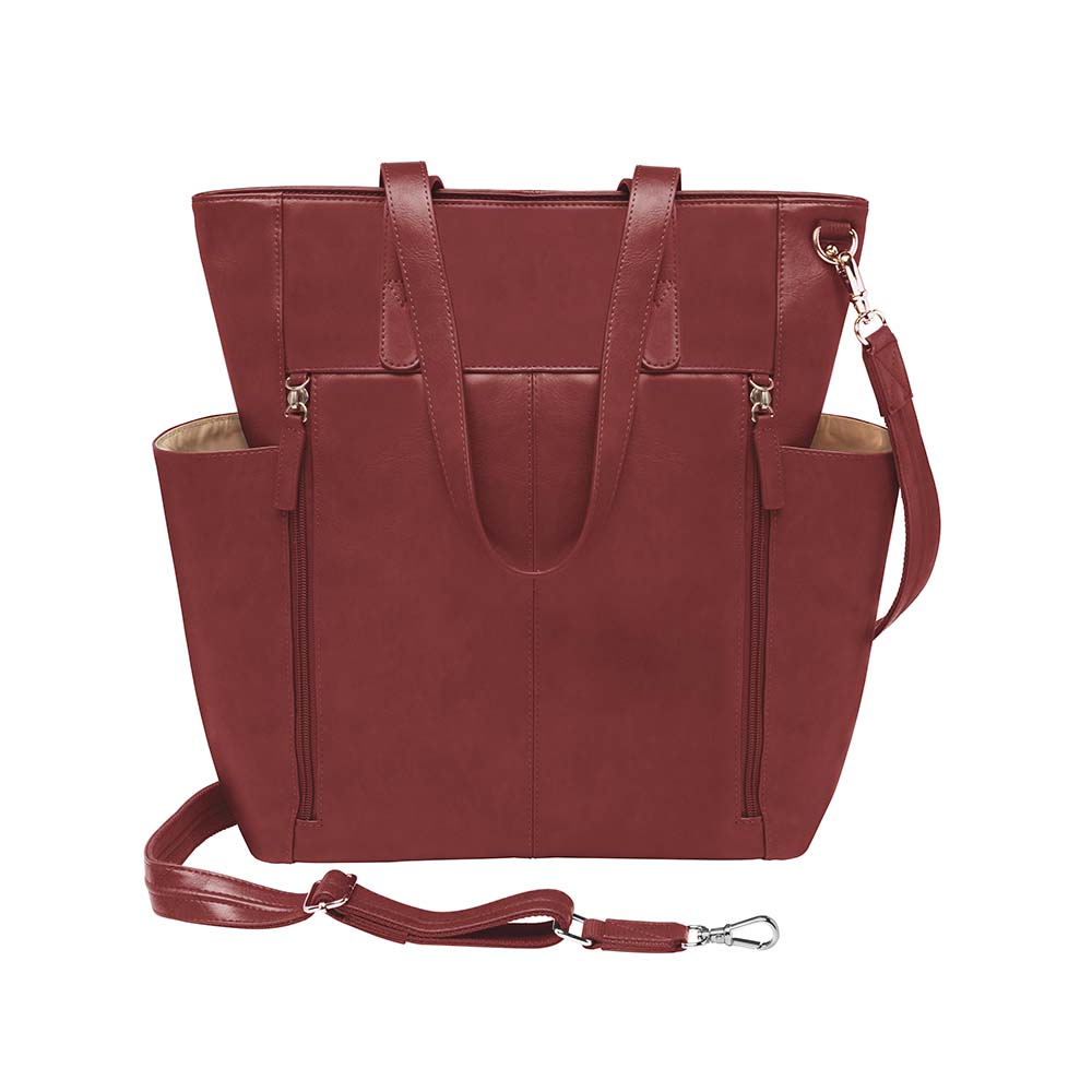 Bold red concealed carry purse – oversized leather tote with crossbody holster for fashion-forward women who carry; perfect for travel, work, or everyday protection.
