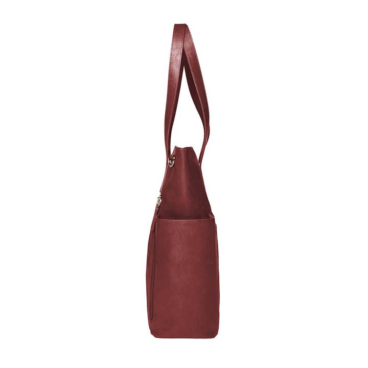 Bold red concealed carry purse – oversized leather tote with crossbody holster for fashion-forward women who carry; perfect for travel, work, or everyday protection.