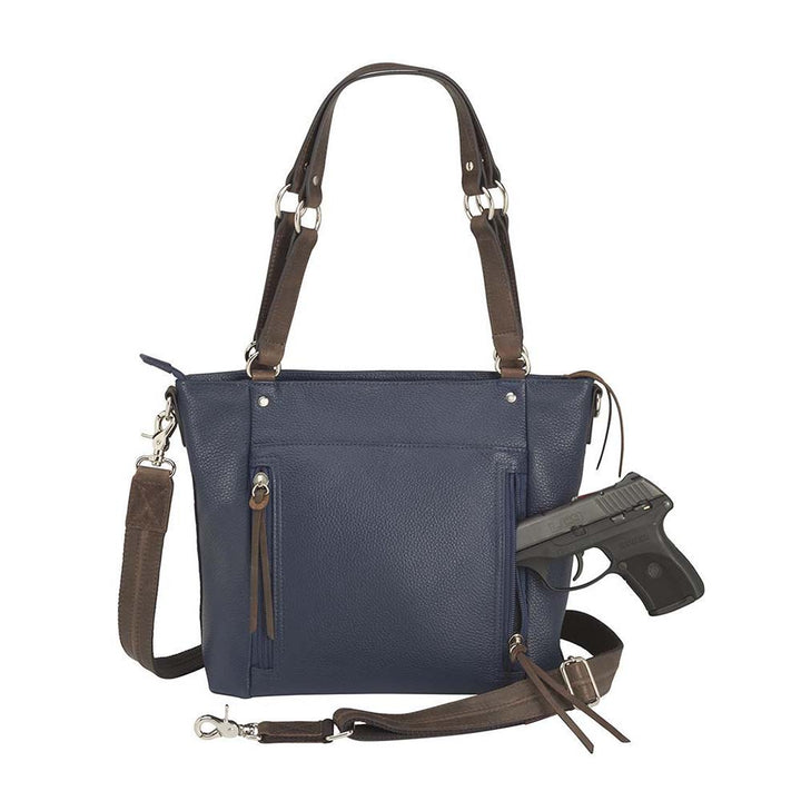 Blue indigo BOHO shoulder tote concealed carry purse combining soft American cowhide and distressed vintage buffalo leather, featuring top draw GTM compartment with rare earth magnets, RFID-protected zippered pocket, adjustable slash-resistant shoulder strap with 11-ply steel cable, antiqued brass hardware, nylon coil zippers, and textured faux bottom with metal feet for stability.