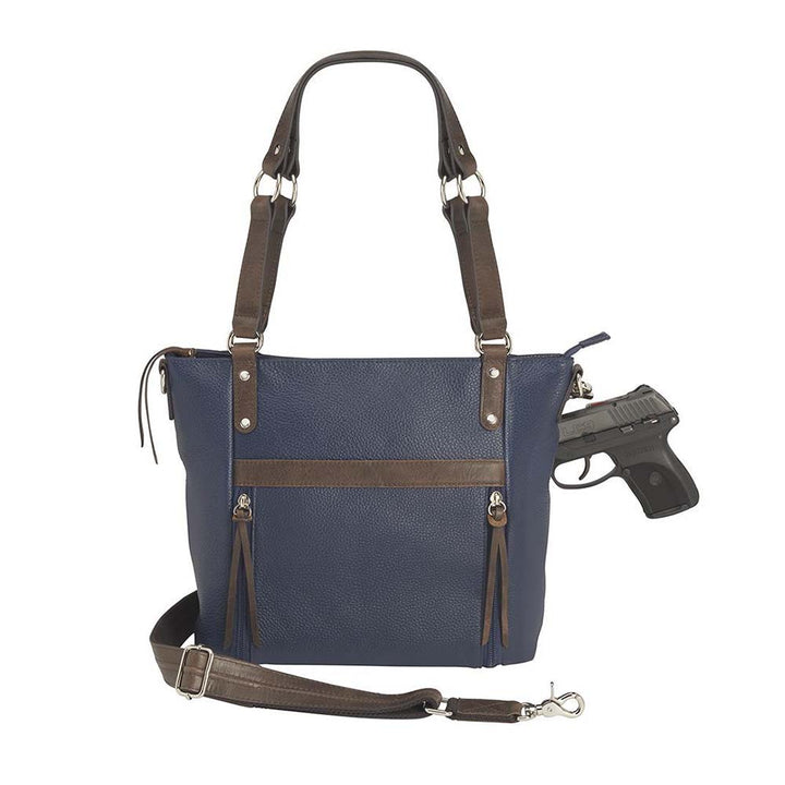 Blue indigo BOHO shoulder tote concealed carry purse combining soft American cowhide and distressed vintage buffalo leather, featuring top draw GTM compartment with rare earth magnets, RFID-protected zippered pocket, adjustable slash-resistant shoulder strap with 11-ply steel cable, antiqued brass hardware, nylon coil zippers, and textured faux bottom with metal feet for stability.