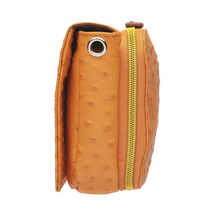 Crossbody Organizer Concealed Carry Purse in debossed American cowhide with ostrich pattern. Features RFID-protected zippered pocket, main compartment for essentials like iPhone Plus, keys, and pepper spray. Slash-resistant shoulder strap with steel reinforcement, rare earth magnetic flap closure. Tested with Springfield Hellcat, Ruger LCP, and more. Lightweight, durable, and designed for left and right-hand use.