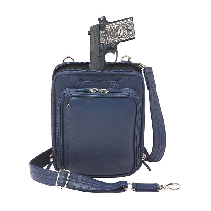 Indigo blue concealed carry crossbody shoulder pouch for women and men, designed to discreetly fit 1911 and compact pistols like Glock 19 and M&P Shield, features padded gun compartment with top, side, and angled draw, RFID-protected interior, full-grain American cowhide with matte finish, slash-resistant strap, three-way zip opening, multiple storage pockets, and Mernickle holster for right or left-hand draw.