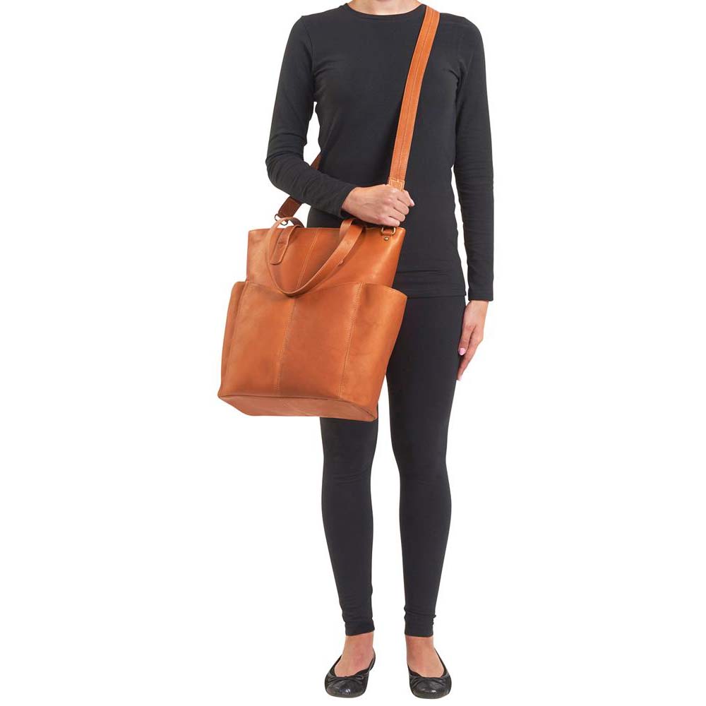 Tan leather oversized concealed carry tote for women – stylish and discreet gun purse for travel, diaper bag duty, or work life; crossbody holster with slash-resistant straps and RFID pockets