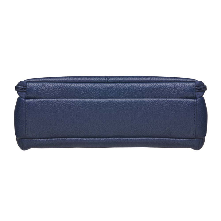 Indigo blue clutch-style concealed carry purse in soft American cowhide with RFID-protected front organizer, adjustable crossbody slash-resistant strap, triple-zip gun access for Glock 27, Ruger LCP, S&W Shield, and more. Lightweight, padded, stylish, and discreet everyday carry solution for women.