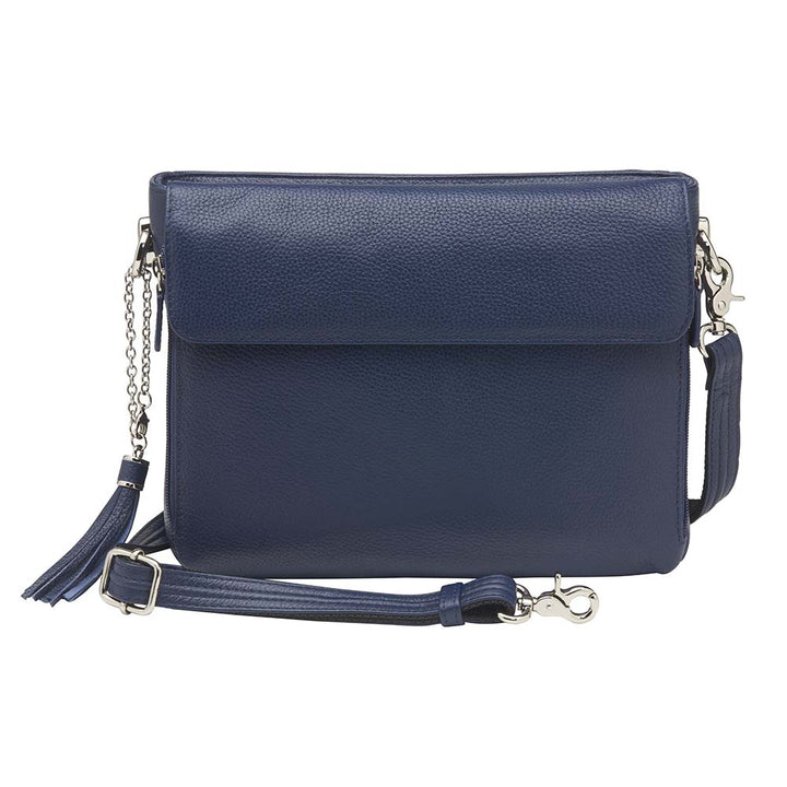 Indigo blue clutch-style concealed carry purse in soft American cowhide with RFID-protected front organizer, adjustable crossbody slash-resistant strap, triple-zip gun access for Glock 27, Ruger LCP, S&W Shield, and more. Lightweight, padded, stylish, and discreet everyday carry solution for women.