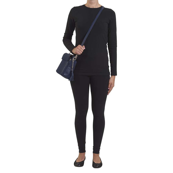 Indigo blue clutch-style concealed carry purse in soft American cowhide with RFID-protected front organizer, adjustable crossbody slash-resistant strap, triple-zip gun access for Glock 27, Ruger LCP, S&W Shield, and more. Lightweight, padded, stylish, and discreet everyday carry solution for women.