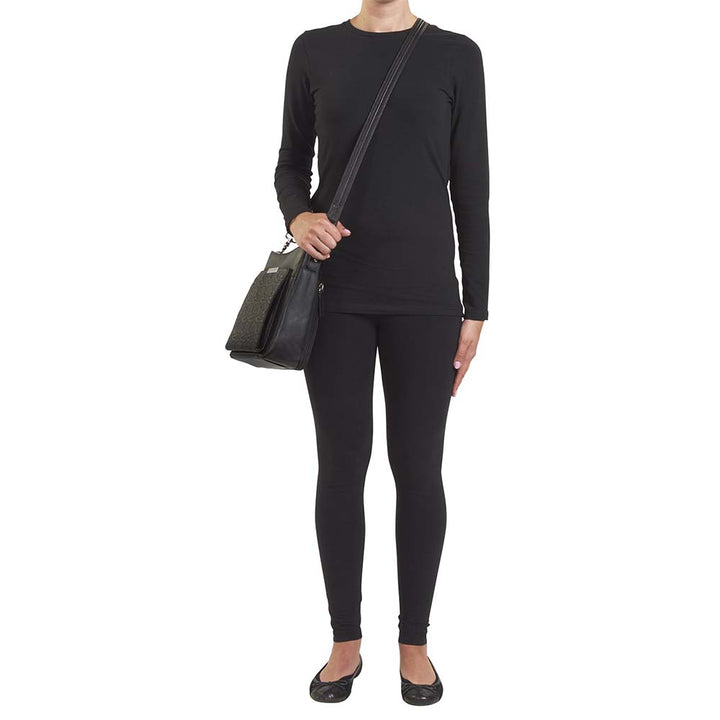 Luxury black lambskin concealed carry crossbody purse made from New Zealand full-grain leather; features RFID-protected wallet organizer, top-draw ambidextrous access, slash-resistant strap, padded CCW holster fits Glock 19, Sig P320, M&P Shield; sleek day-to-night design with magnetic closures and chrome accents.