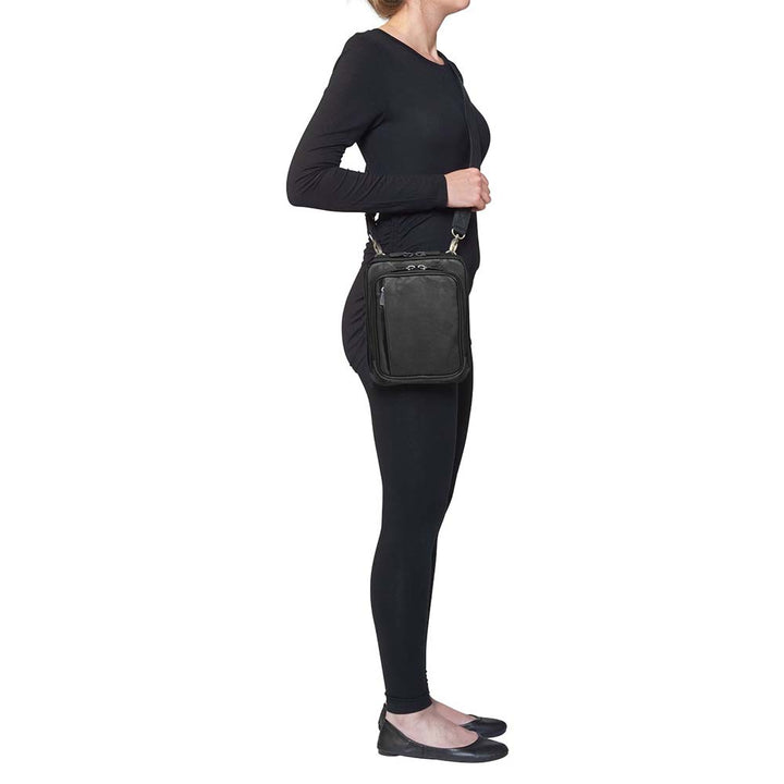 Crossbody concealed carry shoulder pouch in tumbled leather with microfiber accents – fits revolvers to 1911, slash-resistant strap, adjustable for right/left-handed use, includes Mernickle holster, GTM patent pending