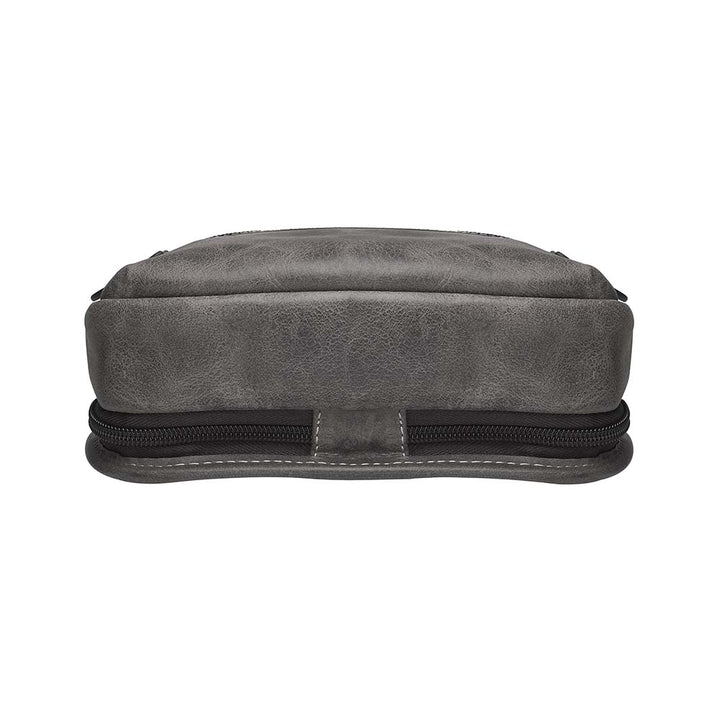 Gray sling backpack concealed carry bag with RFID protection, ambidextrous draw, and padded CCW compartment; lightweight crossbody made for quick access, featuring slash-resistant strap, fits Glock 19, Sig P365, M&P 9mm, and ideal for everyday or EDC use.