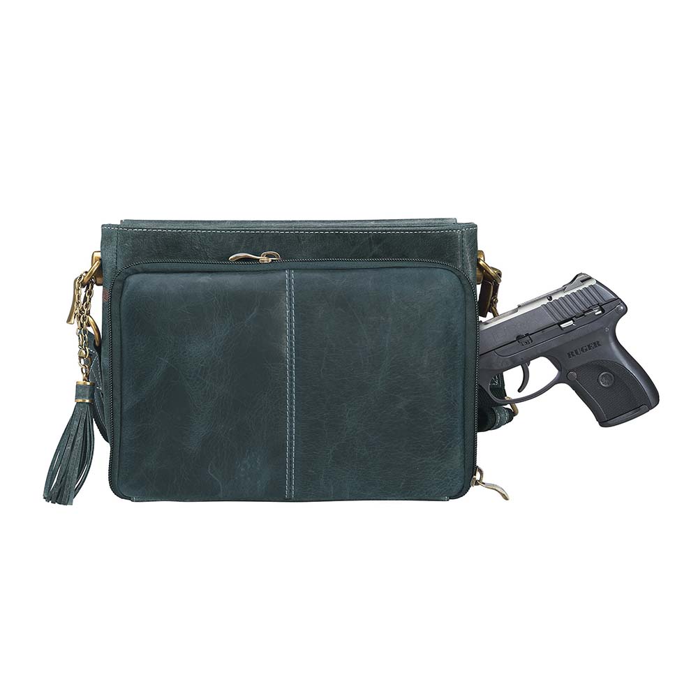 Step up your carry game with this vintage-inspired clutch in rich distressed blue full-grain buffalo leather. The more you rock it, the softer and more unique it becomes thanks to the natural aging process and oils infused during tanning. Designed for both left and right-hand carry, it features special padding to prevent imprinting, plus a slash-resistant shoulder strap reinforced with 11-ply steel wire for maximum security.