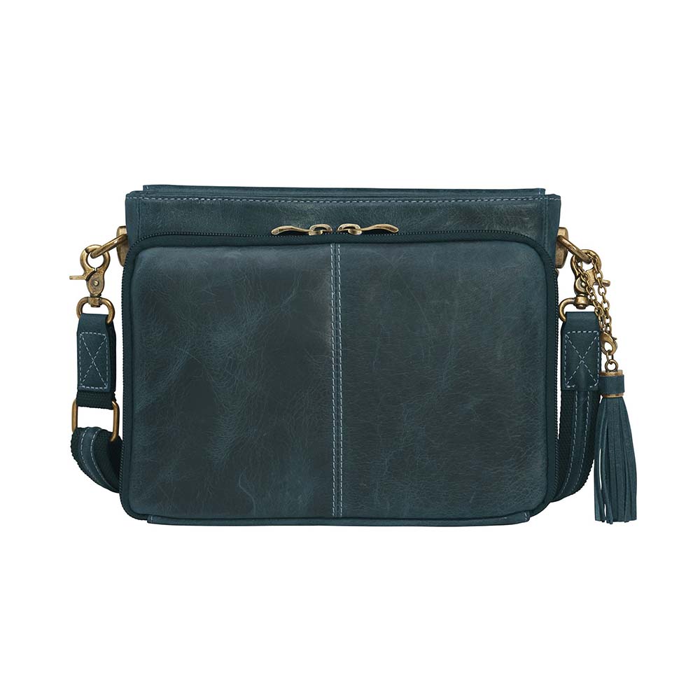 Step up your carry game with this vintage-inspired clutch in rich distressed blue full-grain buffalo leather. The more you rock it, the softer and more unique it becomes thanks to the natural aging process and oils infused during tanning. Designed for both left and right-hand carry, it features special padding to prevent imprinting, plus a slash-resistant shoulder strap reinforced with 11-ply steel wire for maximum security.