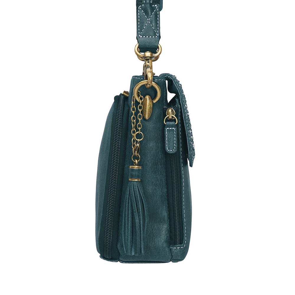 Step up your carry game with this vintage-inspired clutch in rich distressed blue full-grain buffalo leather. The more you rock it, the softer and more unique it becomes thanks to the natural aging process and oils infused during tanning. Designed for both left and right-hand carry, it features special padding to prevent imprinting, plus a slash-resistant shoulder strap reinforced with 11-ply steel wire for maximum security.