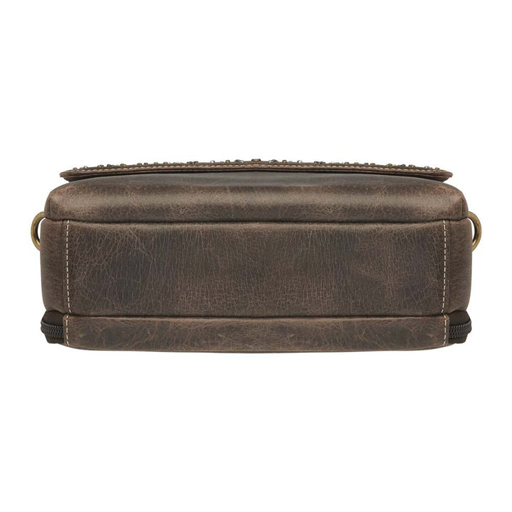 Timeless and tough — this brown distressed full-grain buffalo leather clutch gets better with age and wear. Designed to fit both left and right-handed carriers, it offers special padding to prevent imprinting and a slash-resistant shoulder strap reinforced with 11-ply steel wire for solid security.