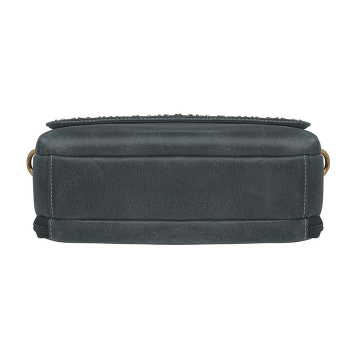 Sleek, stealthy, and practical — this distressed gray leather clutch blends vintage style with tactical function. Made from full-grain buffalo leather, it grows softer and more personal with every use. Equipped for right or left-handed carry, featuring protective padding and a slash-proof shoulder strap reinforced with steel wire.