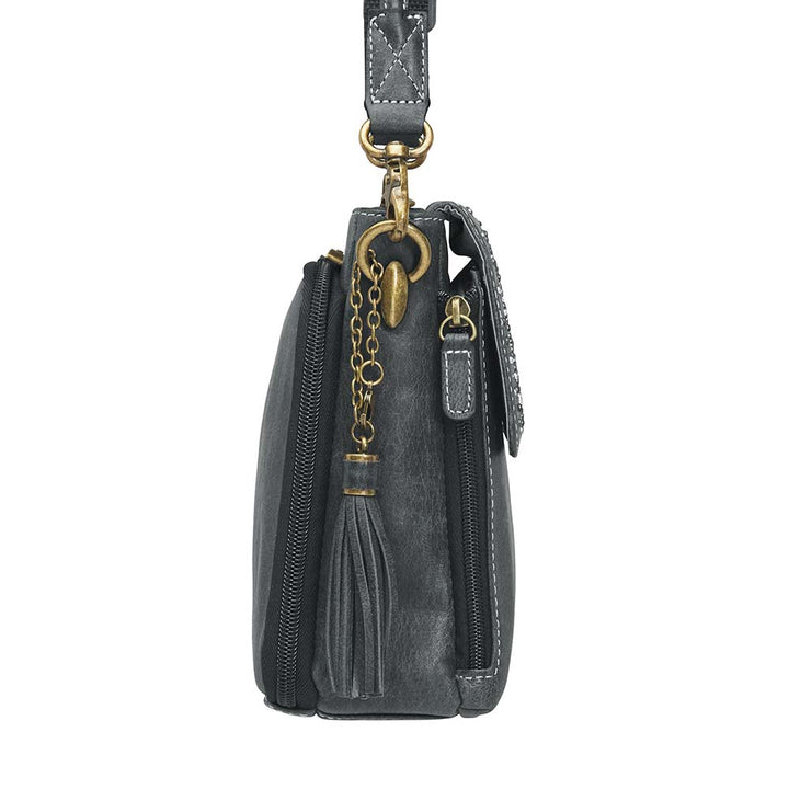 Sleek, stealthy, and practical — this distressed gray leather clutch blends vintage style with tactical function. Made from full-grain buffalo leather, it grows softer and more personal with every use. Equipped for right or left-handed carry, featuring protective padding and a slash-proof shoulder strap reinforced with steel wire.