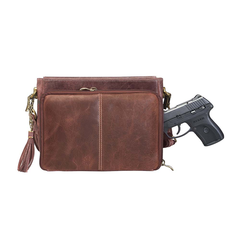 Timeless and tough — this brown distressed full-grain buffalo leather clutch gets better with age and wear. Designed to fit both left and right-handed carriers, it offers special padding to prevent imprinting and a slash-resistant shoulder strap reinforced with 11-ply steel wire for solid security.