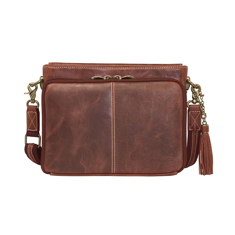 Timeless and tough — this brown distressed full-grain buffalo leather clutch gets better with age and wear. Designed to fit both left and right-handed carriers, it offers special padding to prevent imprinting and a slash-resistant shoulder strap reinforced with 11-ply steel wire for solid security.
