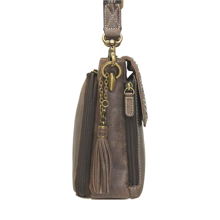 Timeless and tough — this brown distressed full-grain buffalo leather clutch gets better with age and wear. Designed to fit both left and right-handed carriers, it offers special padding to prevent imprinting and a slash-resistant shoulder strap reinforced with 11-ply steel wire for solid security.