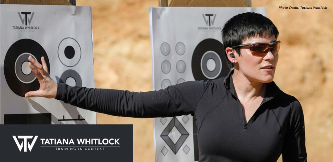 Tatiana Whitlock concealed carry expert explaining to women at gun range