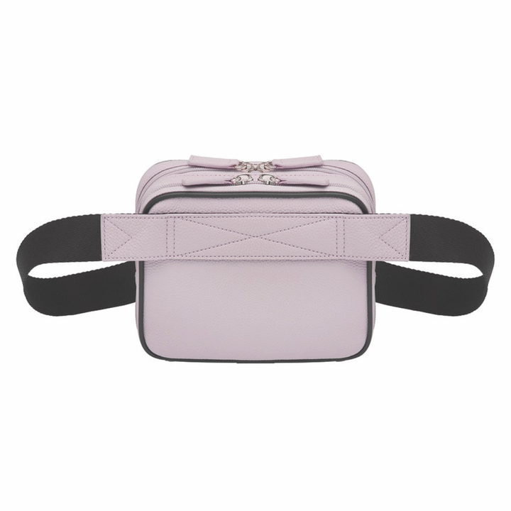 Lavender concealed carry sling waist pack made from soft pebbled American cowhide, with RFID zip pocket, crossbody or waist wear options, and discreet 3-sided access gun compartment with MINI holster compatibility.